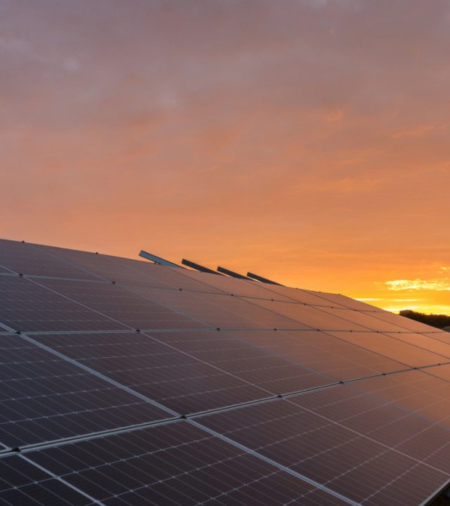 solar-panels-with-sunset - 1920 x 880